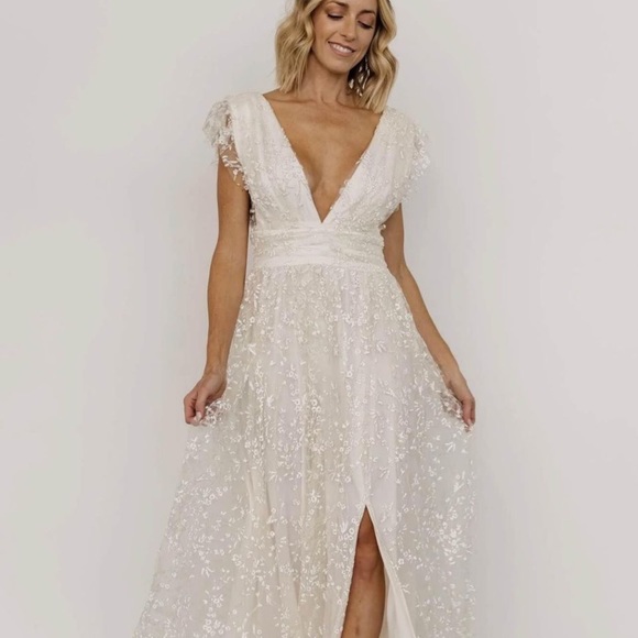 Baltic Born Dresses & Skirts - Wedding Dress Ivory in color
Size M 
New Wedding Dress
Shimmer Gown